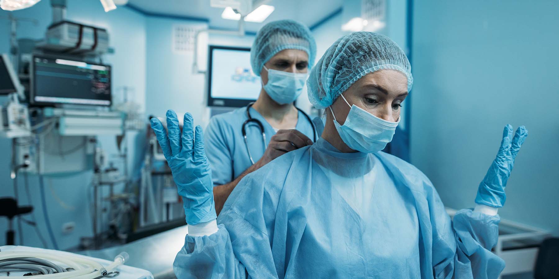 Surgeon preparing for operation in private hospital