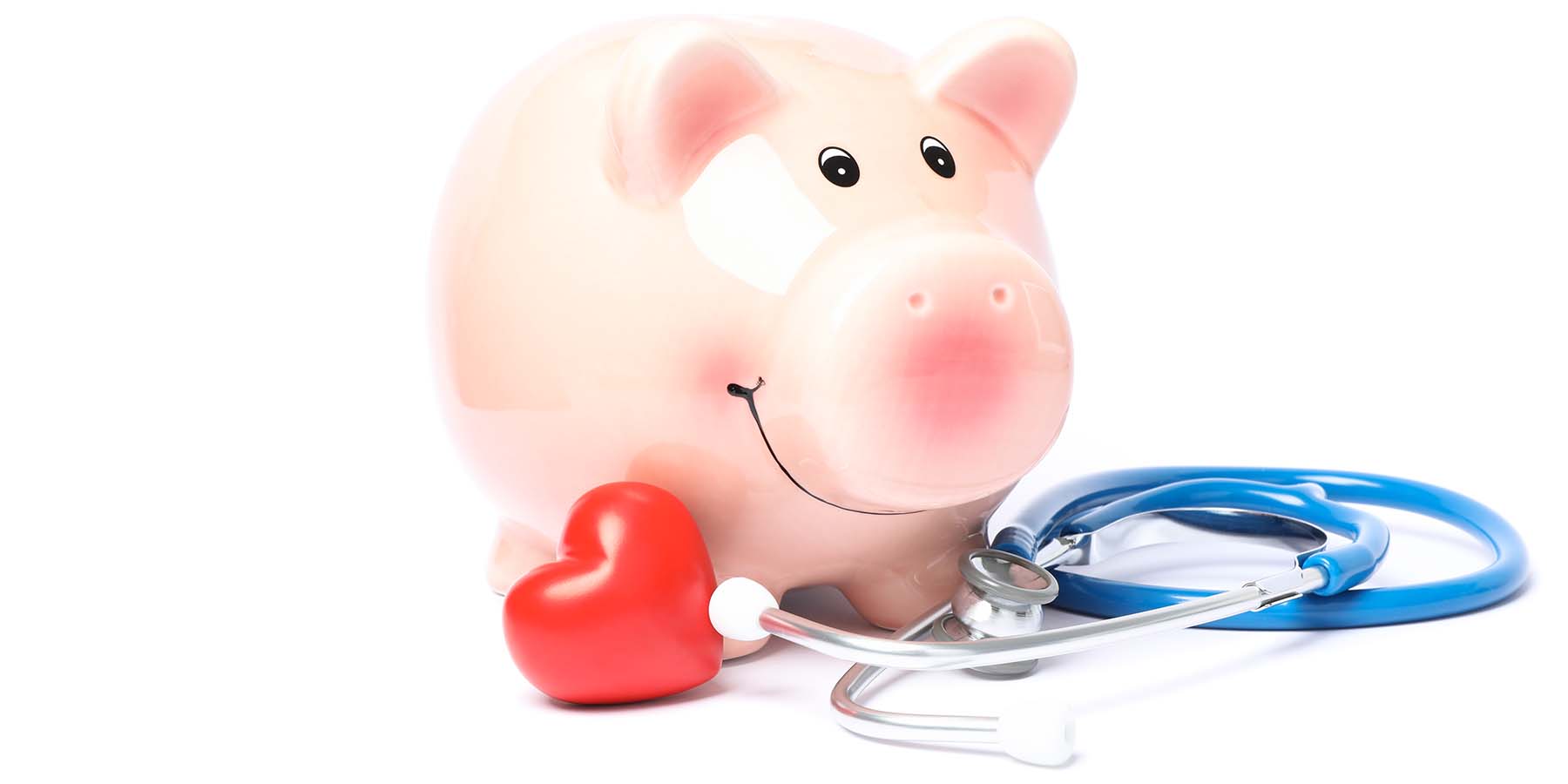 Piggy bank, heart and stethoscope representing the cost of private health insurance